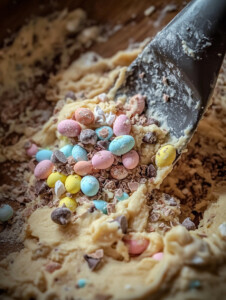 In a large mixing bowl, beat butter, brown sugar, and granulated sugar until light and fluffy. Add eggs one at a time, then mix in vanilla extract.