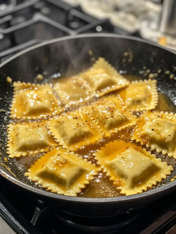 Pour in 1 cup of water and bring to a gentle simmer. Add the cheese ravioli directly to the skillet. Cover and cook for 5 minutes, stirring occasionally, until tender.