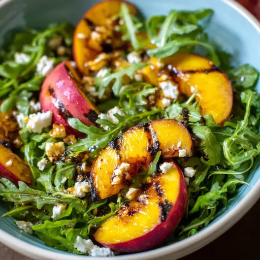 grilled peach and arugula salad